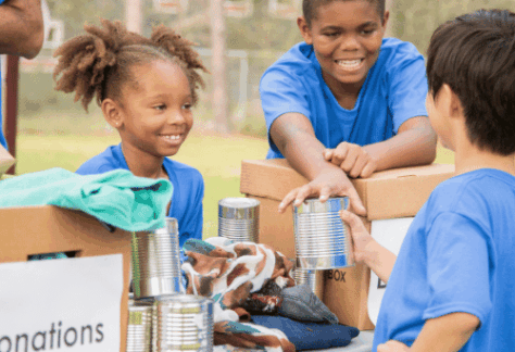 Kids donating food for homeless shelter