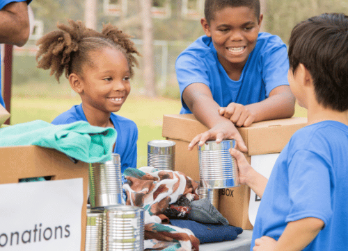 Kids donating food for homeless shelter